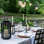Black Lantern with Flameless Candle 12 Inch Realistic Pillar Candle Waterproof Metal for Outdoor Decor Rustic Centerpiece or Decorative Patio Lighting Batteries Included