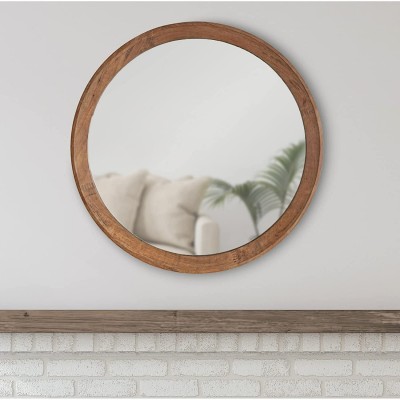 Calixta Modern Accent Mirror Frame Design: Classic This Mirror Offers Your Home a Contemporary Accent with its Sleek Round Shape